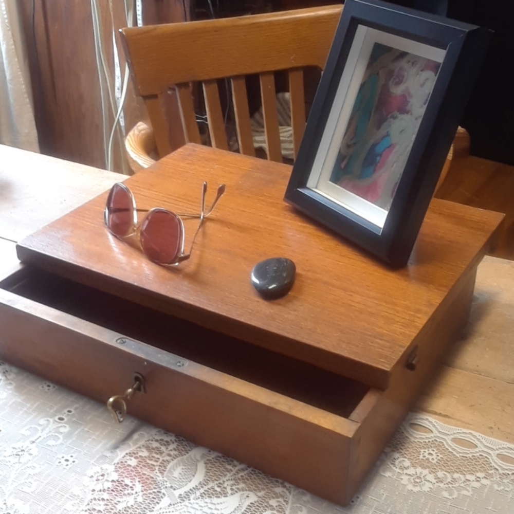 Antique dovetailed wood drawer with brass key